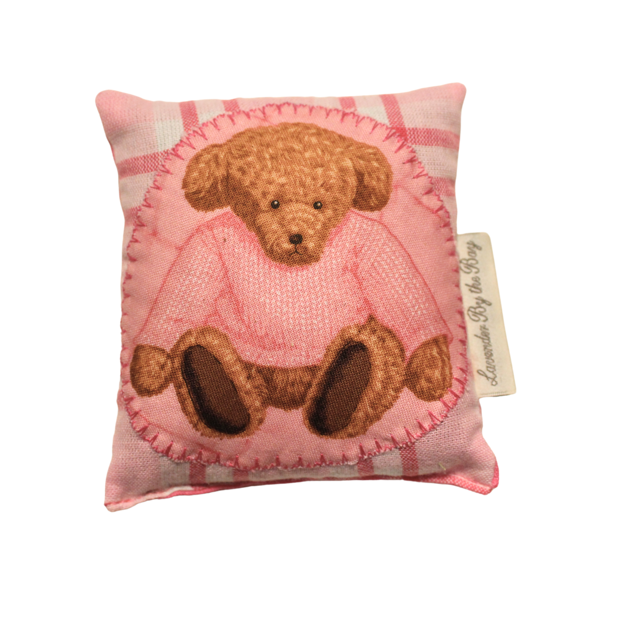 Another of our handmade lavender sachets featuring a stting teddy bear with a pink sweater