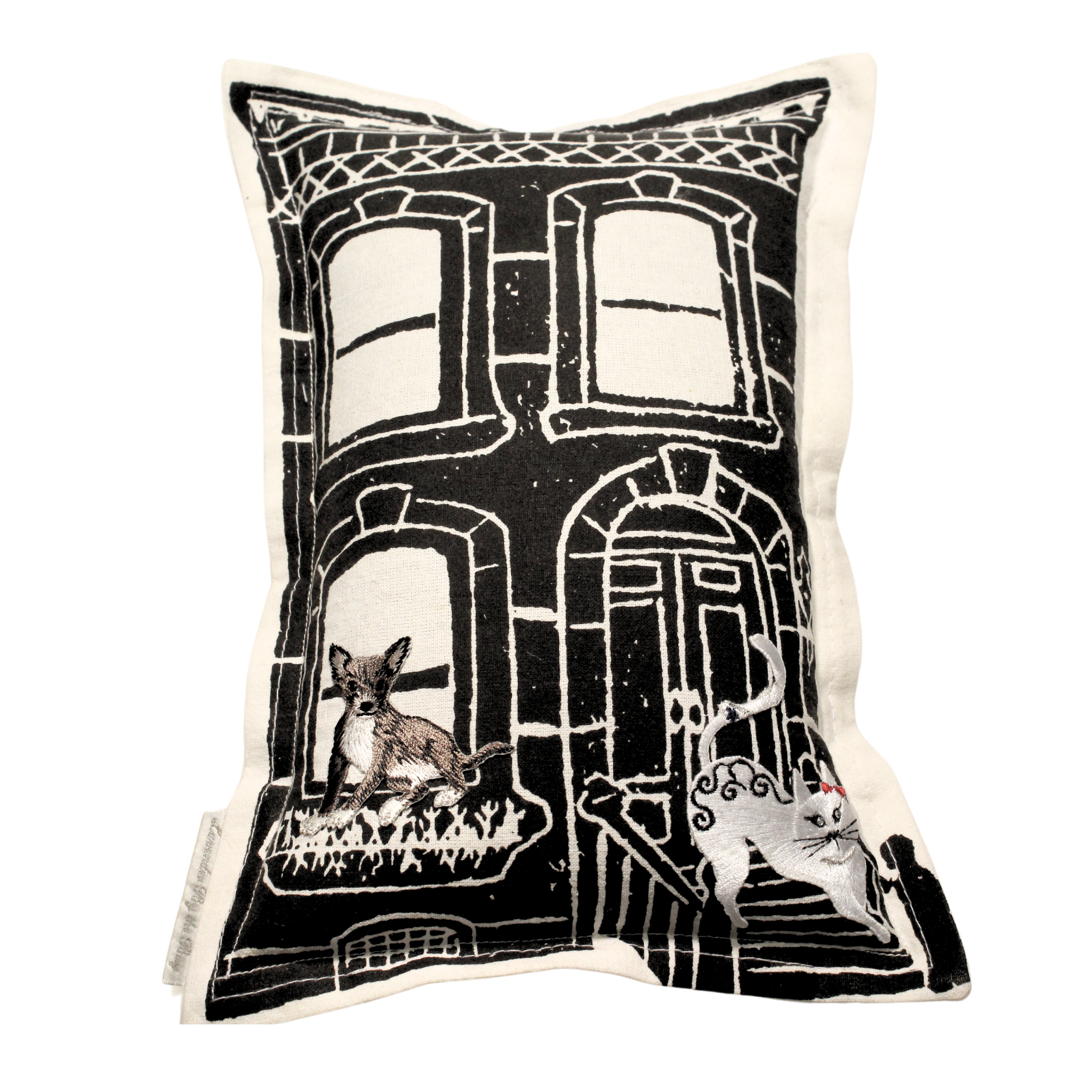 Lavender sachet with an embroidered New York City buidling and furry animals