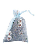 A blue lavender sachet with a daisy pattern, tied with a light blue ribbon