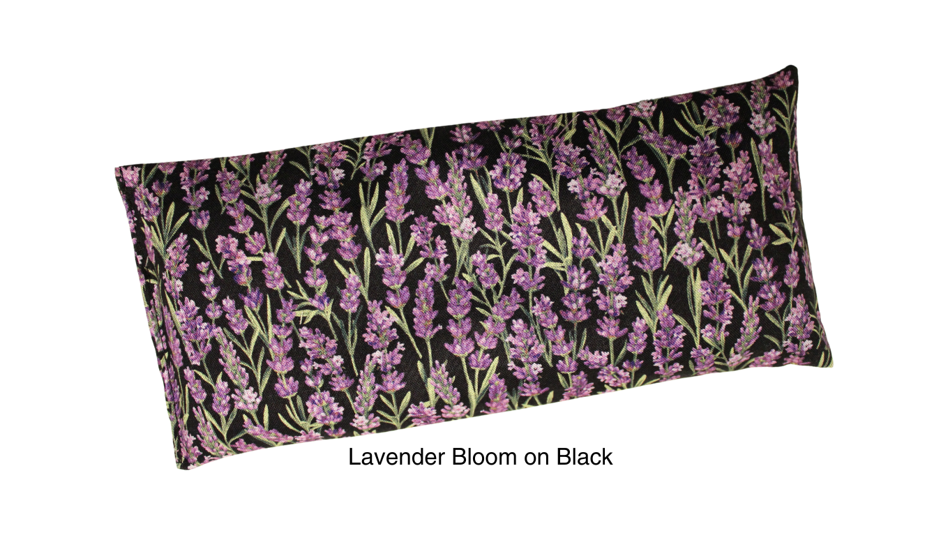 Lavender Bloom on Black yoga eye pillow on white background