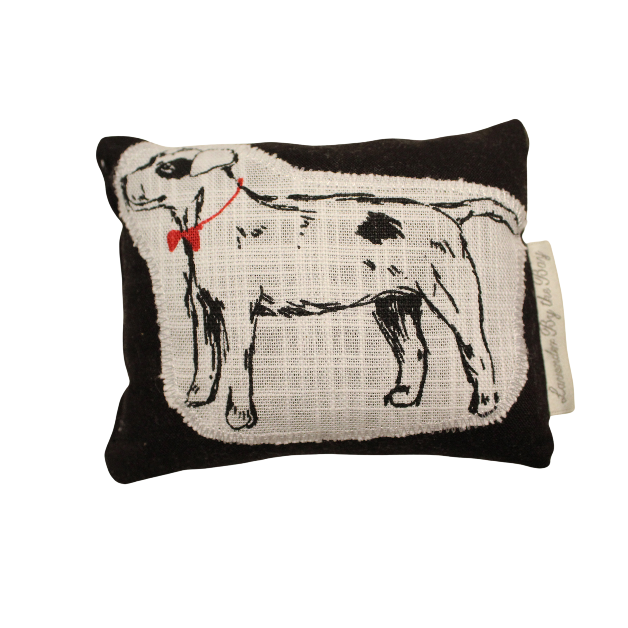 A black dried lavender sachet
with an embroidered image of a white dog wearing a red bow tie