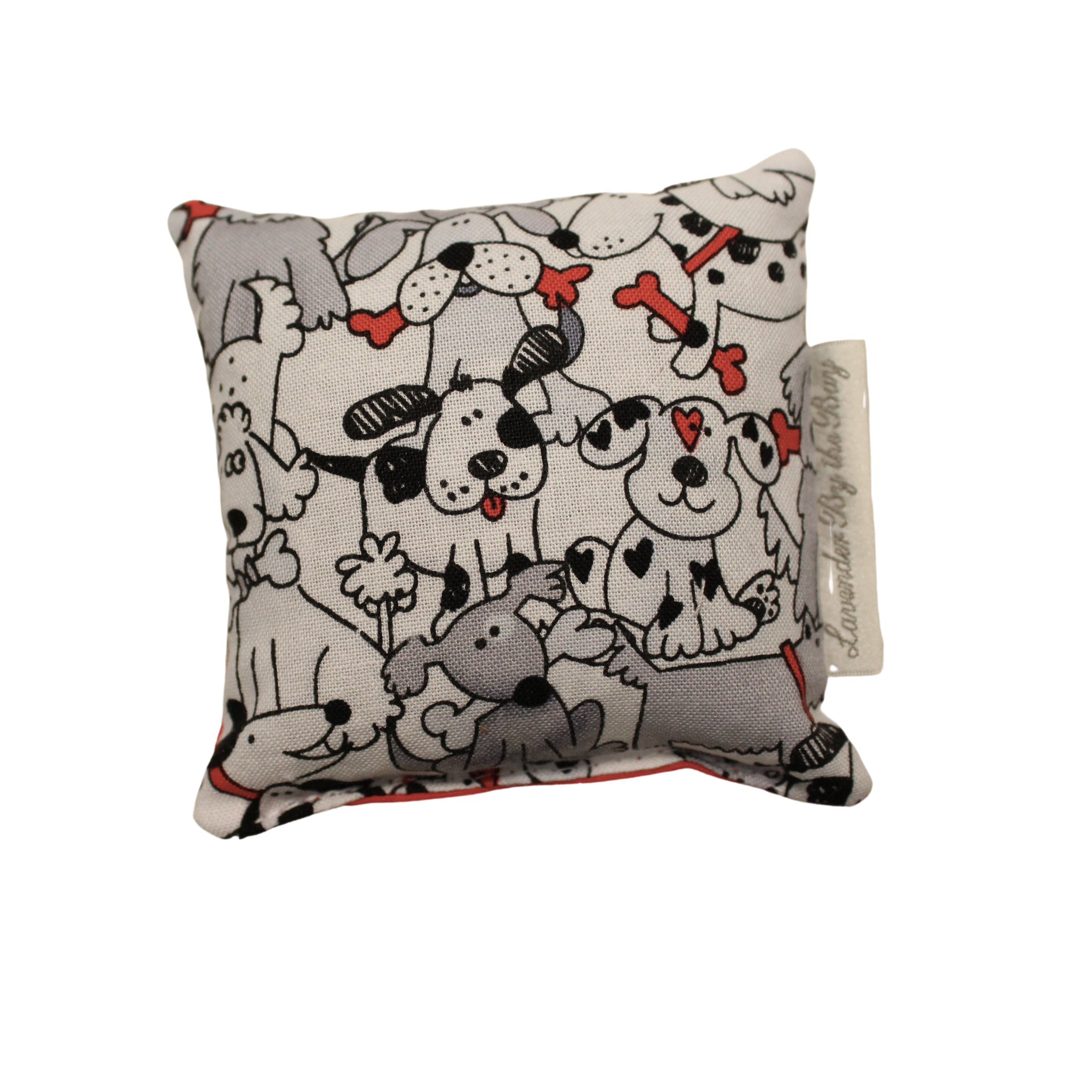 A small, square-shaped Lavender Sachet with a busy pattern of various dog breeds, including Dalmatians, terriers, and poodles