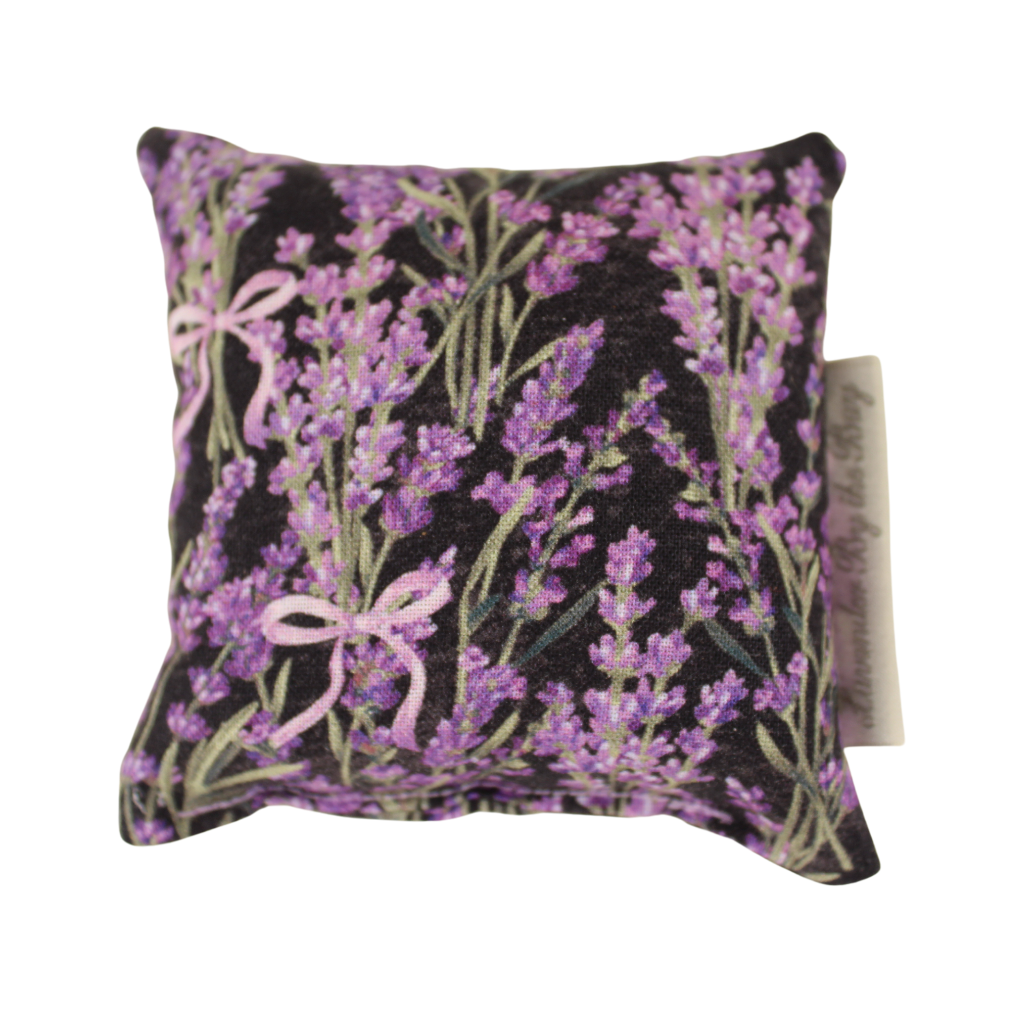 A small, square-shaped sachet with a floral pattern featuring Lavender Prints of flowers and pink ribbons