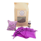 image of the lavender bundle featuring 1/2 lb bag of dried French lavender, 10ml bottle of lavender essential oil, pack of 10 purple empty sachet bags, and 1 lavender sachet on white background