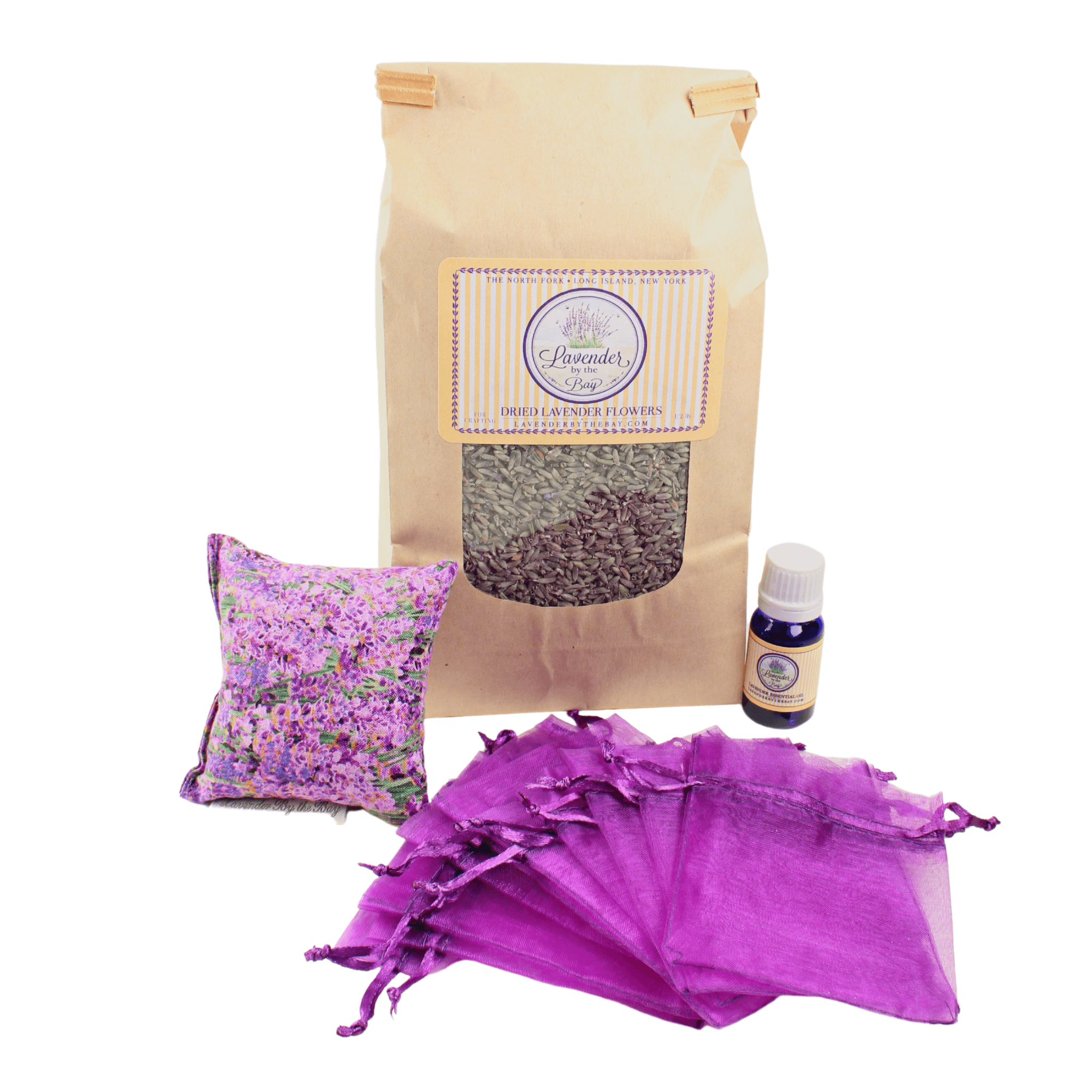 image of the lavender bundle featuring 1/2 lb bag of dried French lavender, 10ml bottle of lavender essential oil, pack of 10 purple empty sachet bags, and 1 lavender sachet on white background