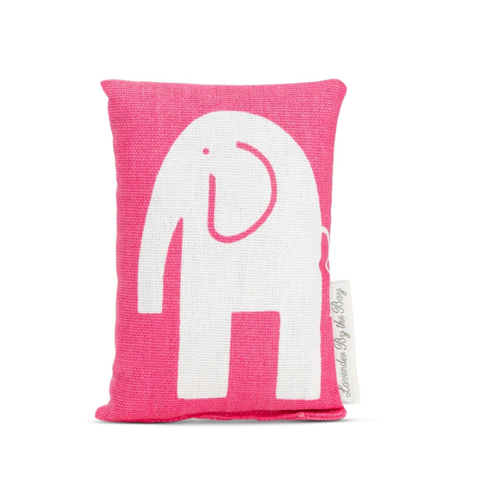 The gift for a new baby a pink elephant lavender sachet on white background