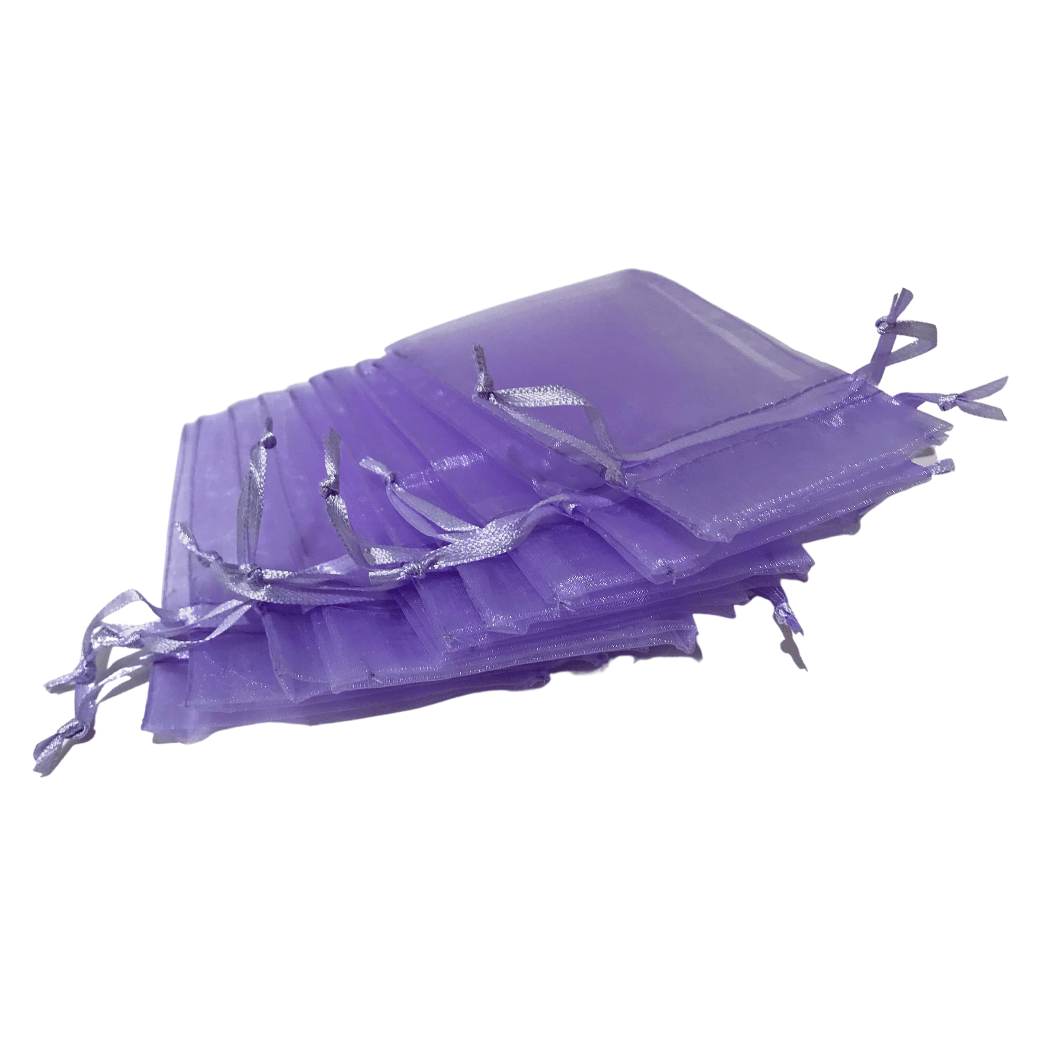 Set of 10 purpule empty sachet bags for crafting in a pile on white background