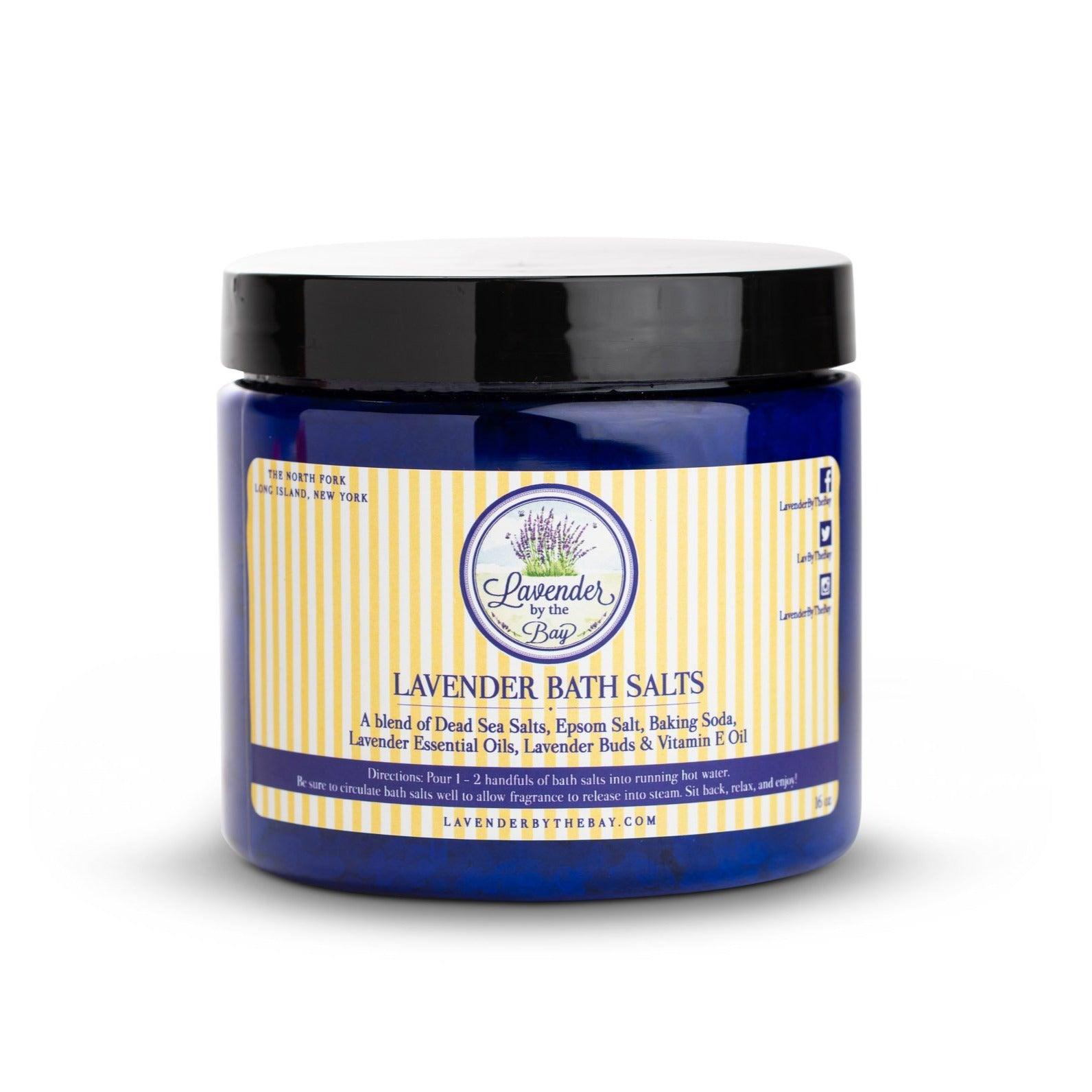 the blue round bottle of the Lavender bath salts on white backgroung