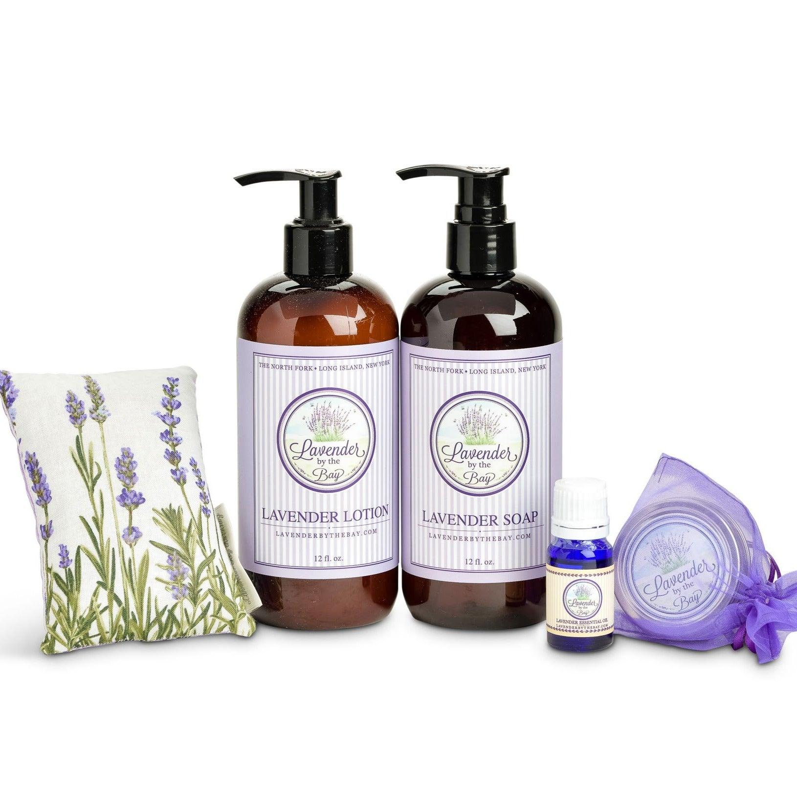 Lavender Gift set with Liquid Soap, Lavender Lotion, Lavender Essential Oil, Lavender Lotion Bar, and a Lavender Sachet on white background