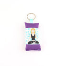 Blonde yoga girl design featuring on embroidered keychain tag sachet on white backgroung