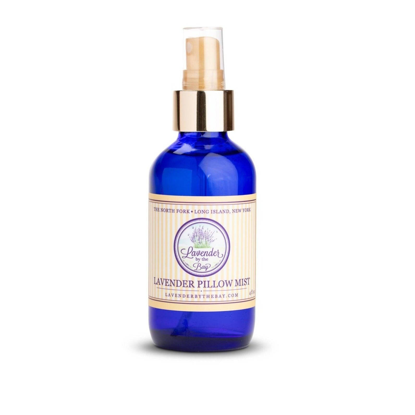 The Lavender pillow mist blue bottle standing on white background