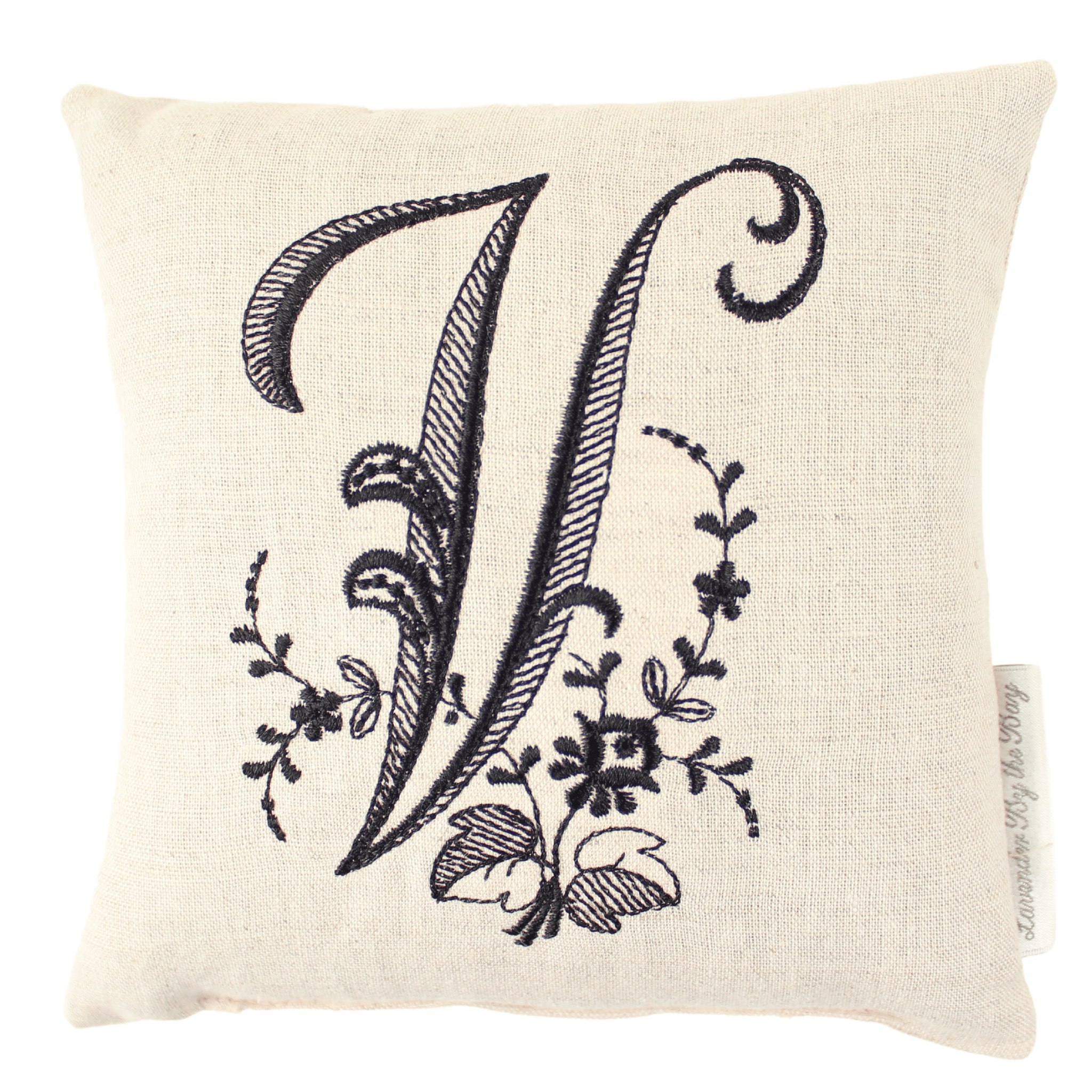 custom monogrammed pillow with black V letter on white background