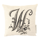 lavender pillow with black W letter on white background