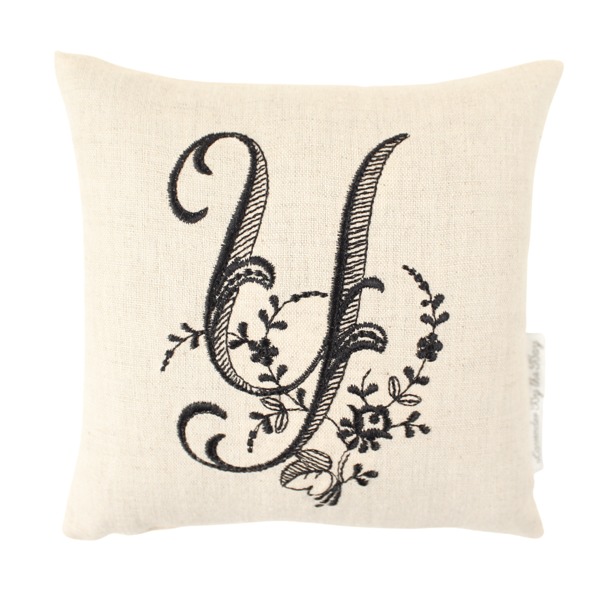 Monogrammed bed pillow with black Y letter on white background
