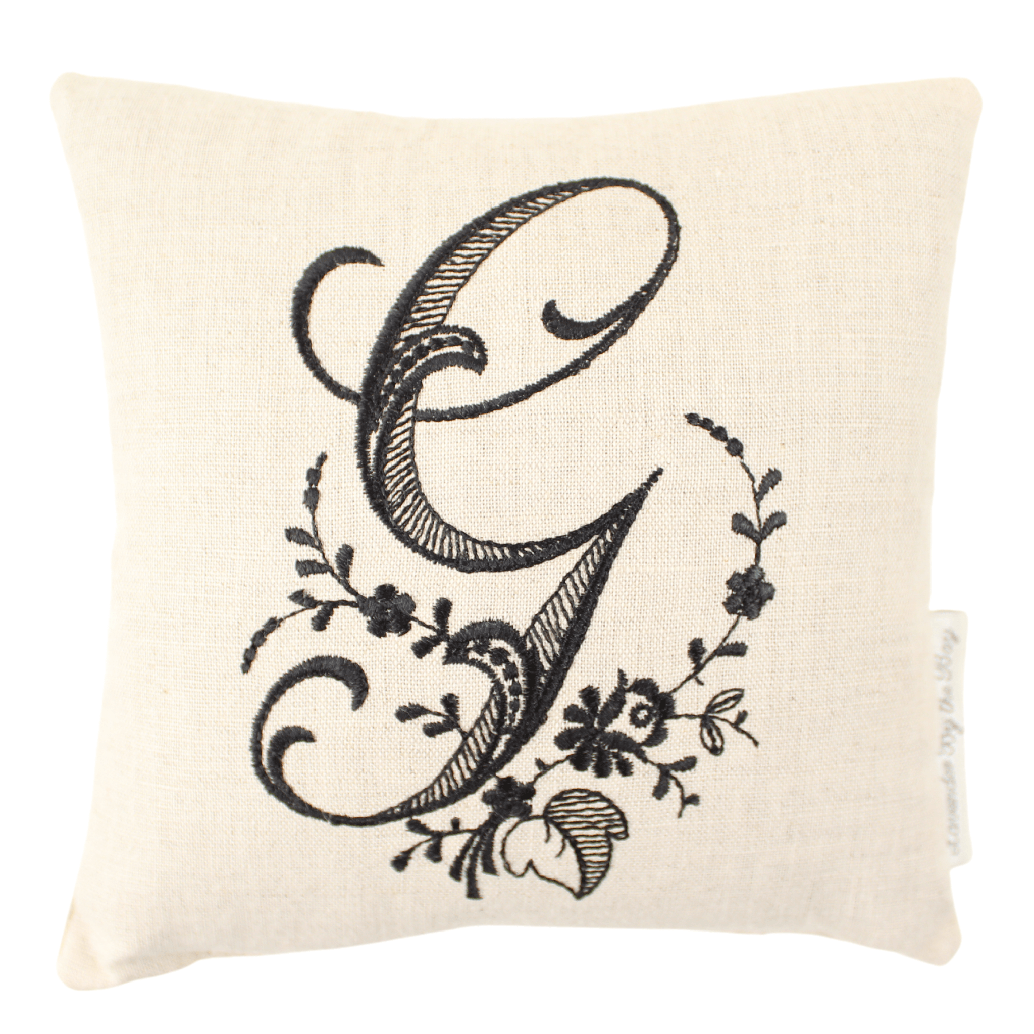 Monogrammed lavender pillow sachet with black letter G on white background