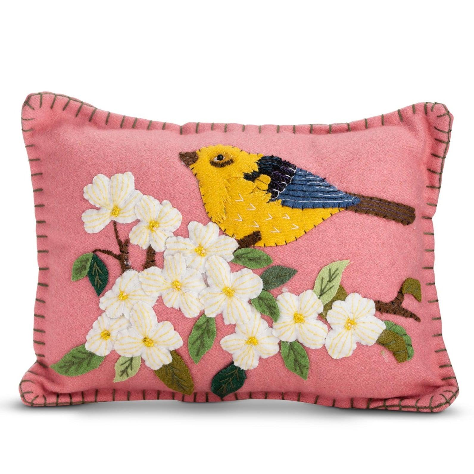 hand-embroidered Pink applique bird pillow on white background