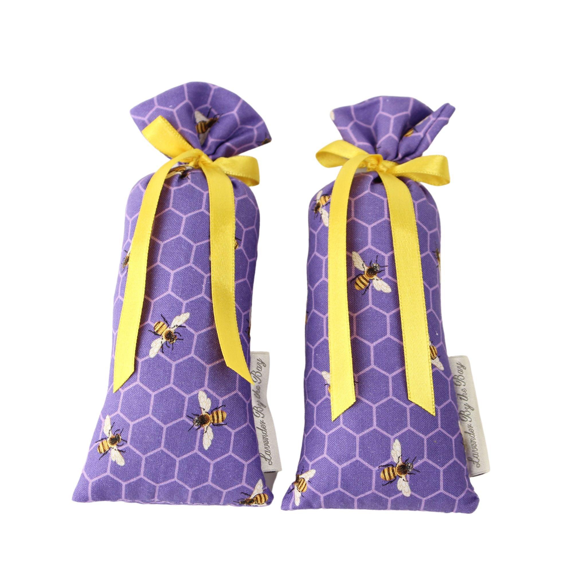 Set of two Honey bees ribbon lavender sachets for moths on white background