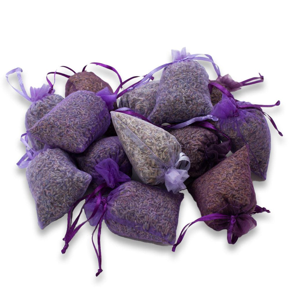 A pile of 15 Sheer Lavender closet Sachets on white background
