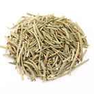 A pile of dried rosemary needles, a popular herb used in tea cooking and medicine on white background